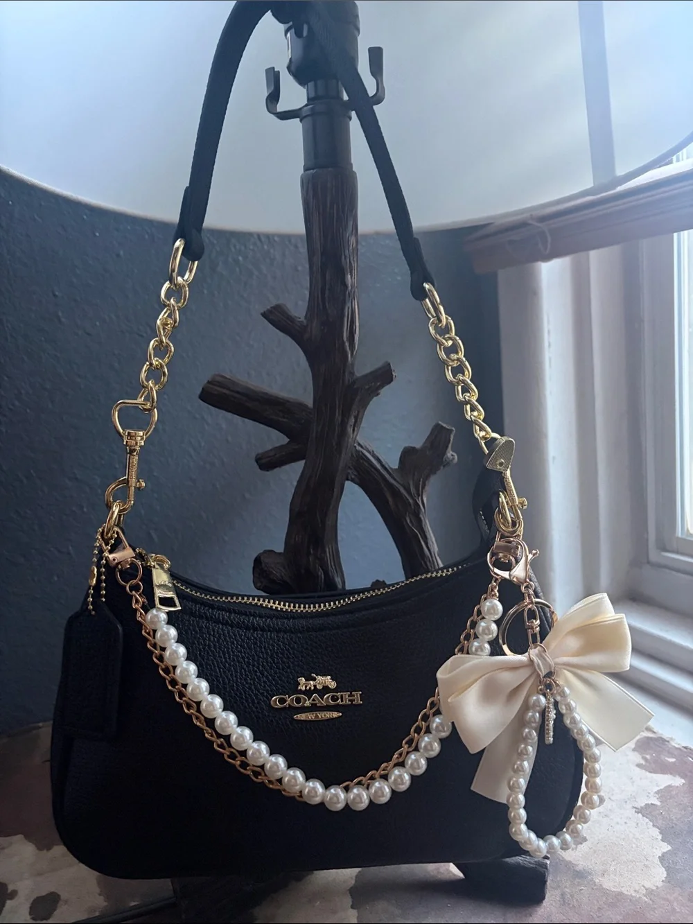 Coach Black Pebbled Leather Shoulder Bag with Gold Hardware & Pearl Charm